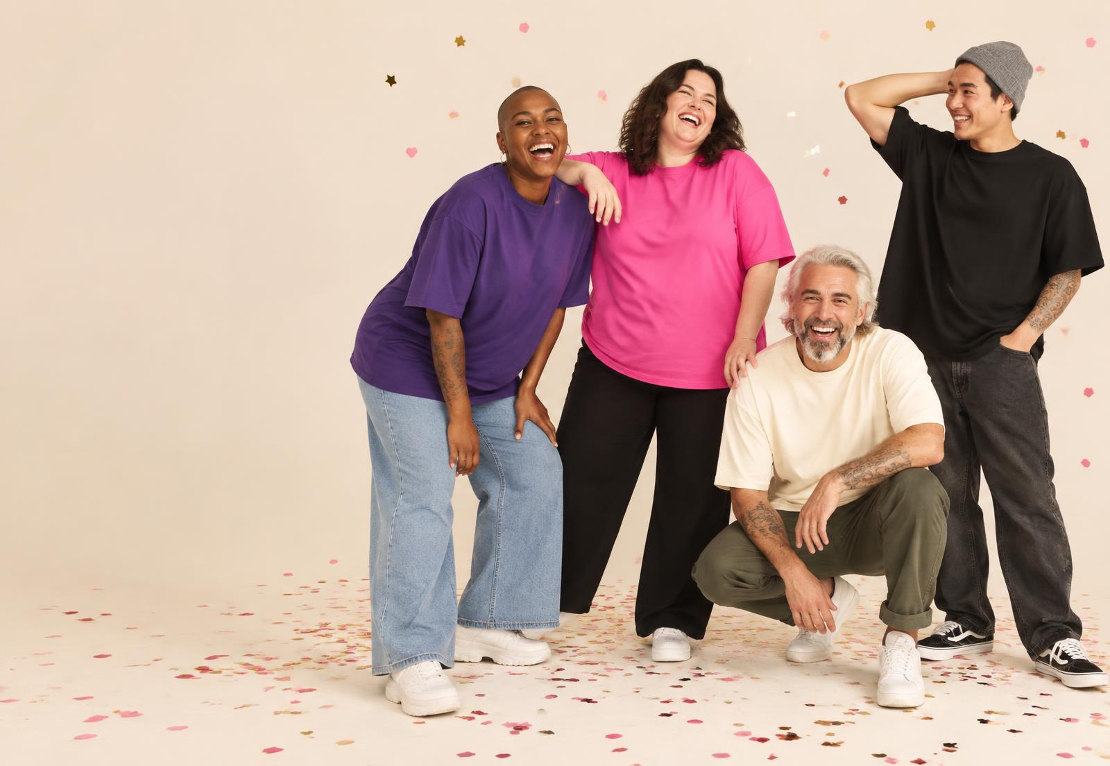 A diverse group of friends laughing together in colorful shirts